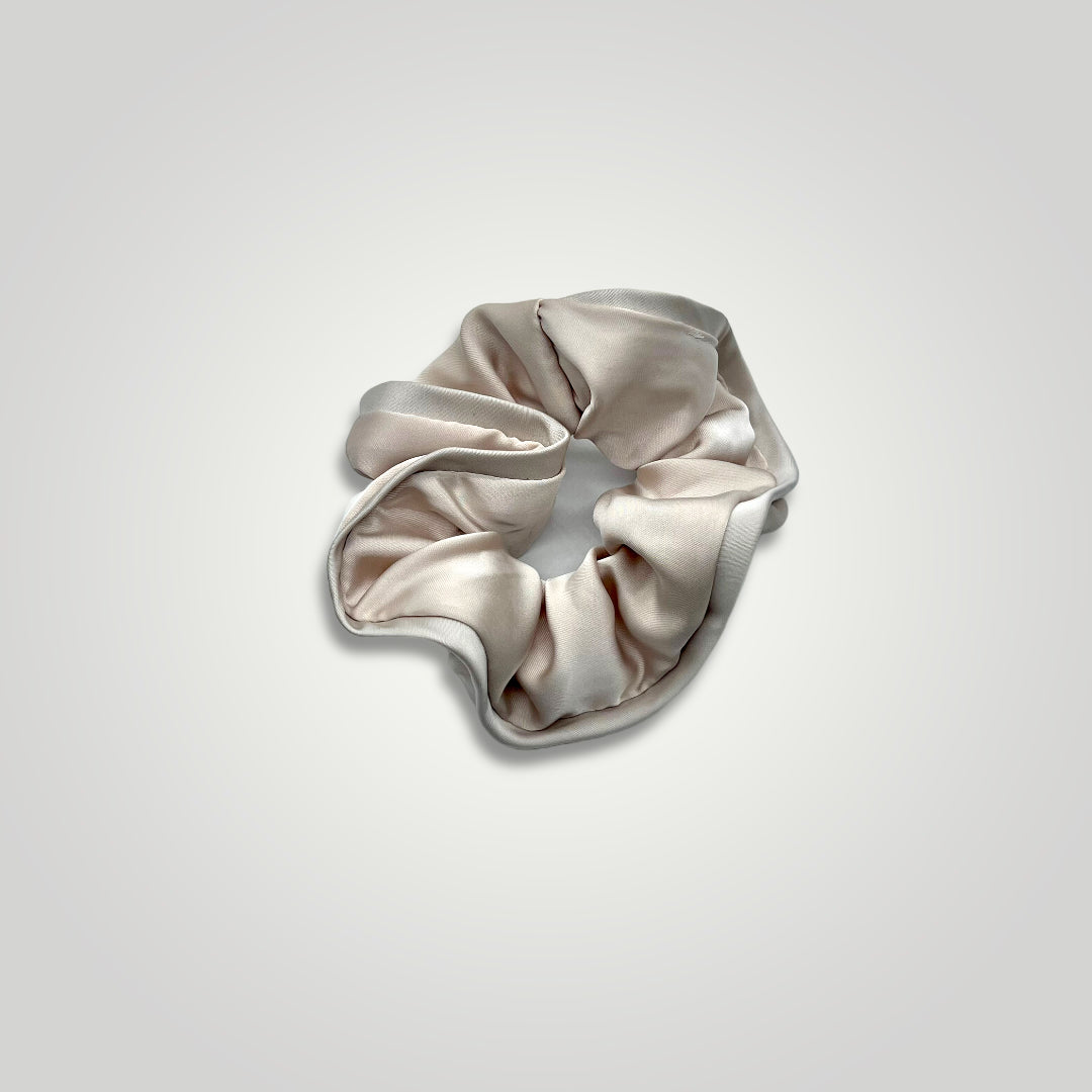 1 High end scrunchie with rivetted borders. Color: Ivory