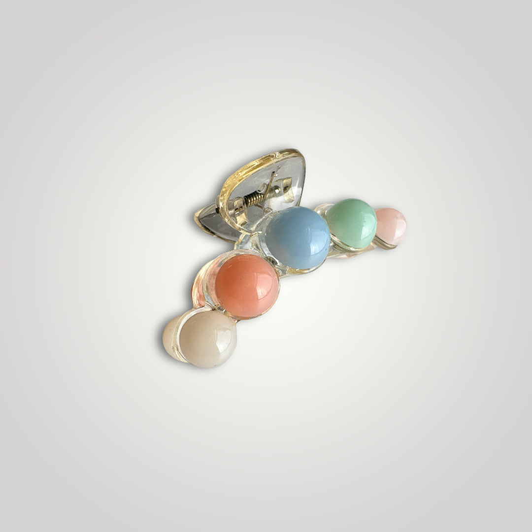 Small multicolored claw clip. Colors: Pink, Green, Baby Blue, Apricot and Ivory.
