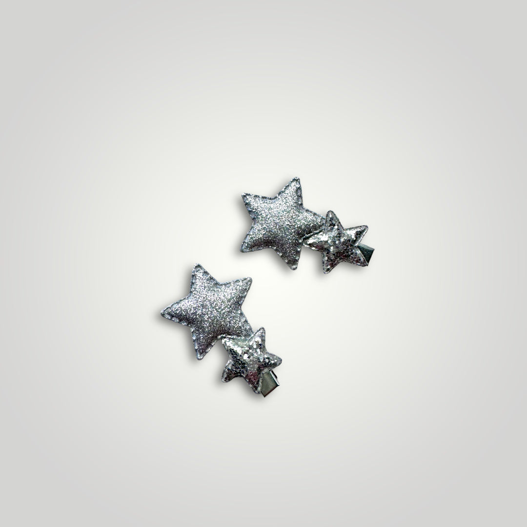 Pair of glittery starts with clip, colors: Silver.