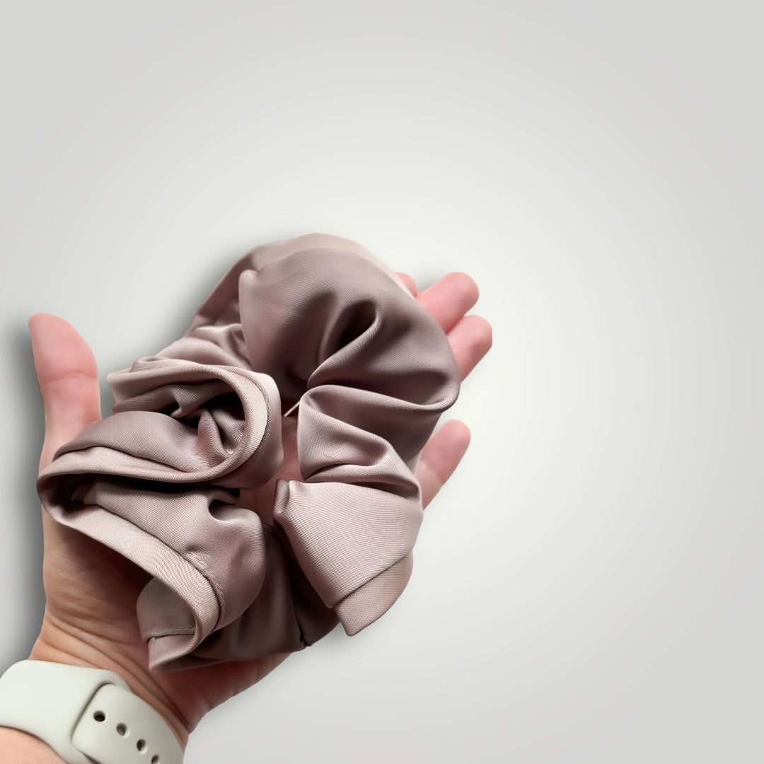 1 High end big scrunchie with rivetted borders. Color: Taupe
