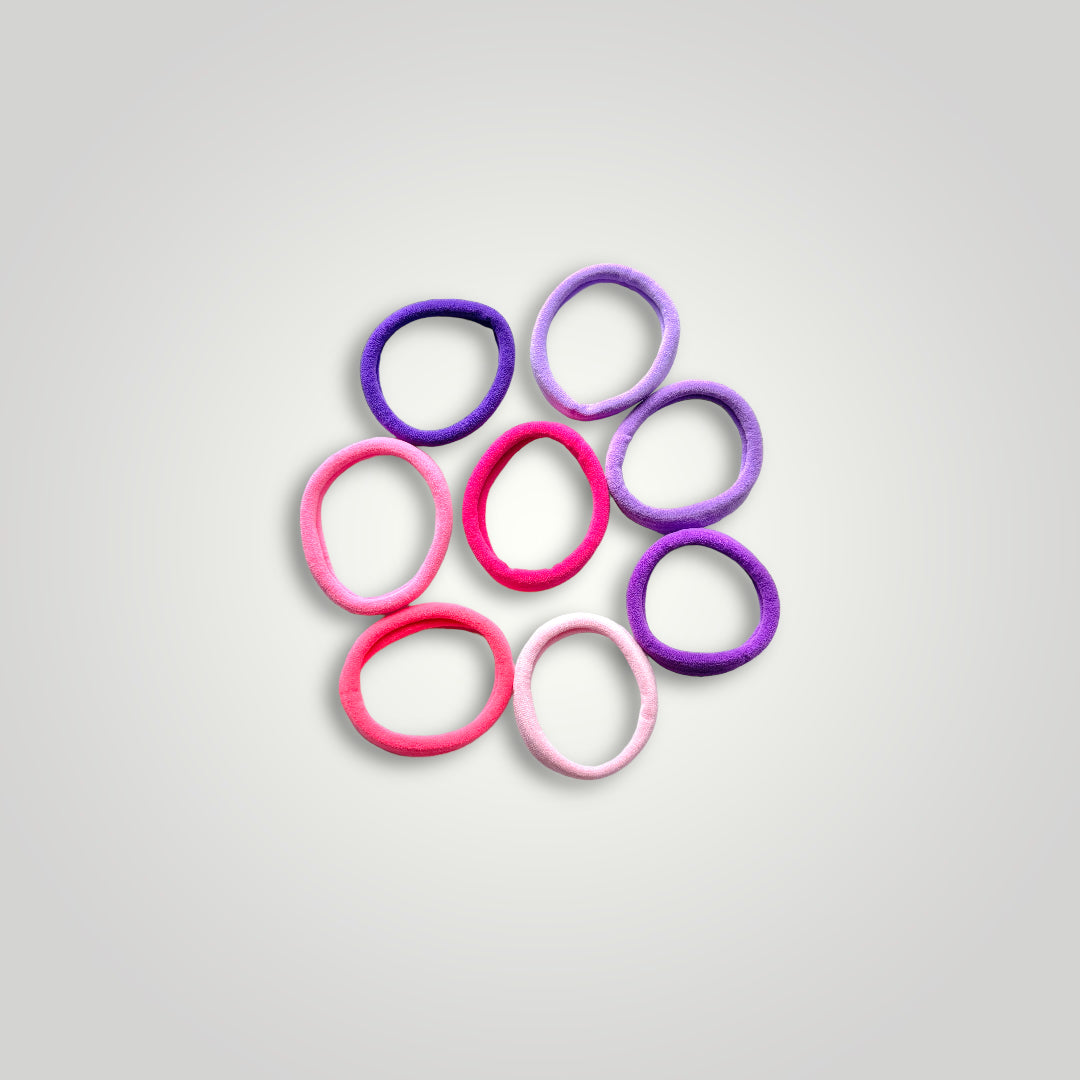 8 units of soft hair ties, 5cm diameter. Colors: From Pink to Purple.