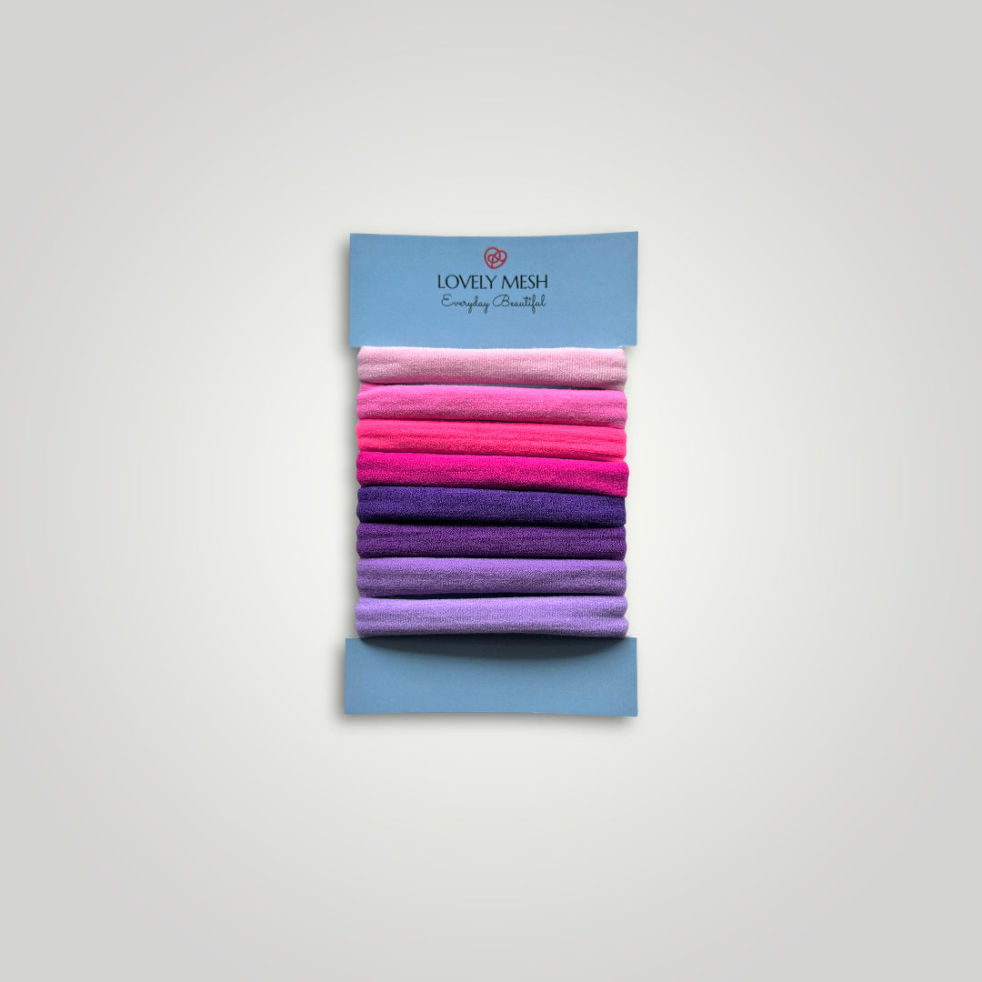 8 units of soft hair ties, 5cm diameter. Colors: From Pink to Purple.